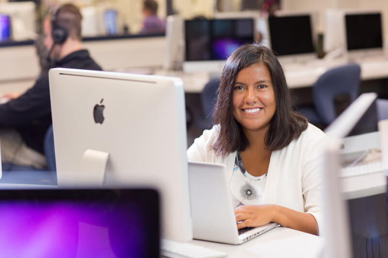 woman sitting in computer lab