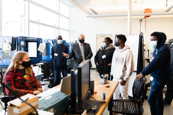 Dean Paul Plotkowski gives a tour in an engineering building for SAU students