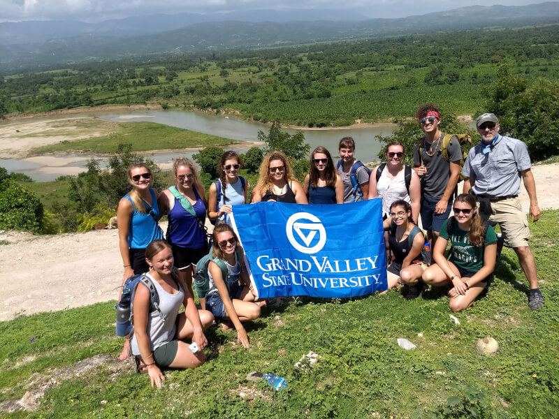 The 2018 Haiti study abroad group at a fort overlooking the Artibonite River near Petite Rivière de l'Artibonite, Haiti.