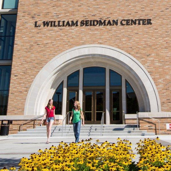 Students exit the L. William Seidman Center, home of the Seidman College of Business