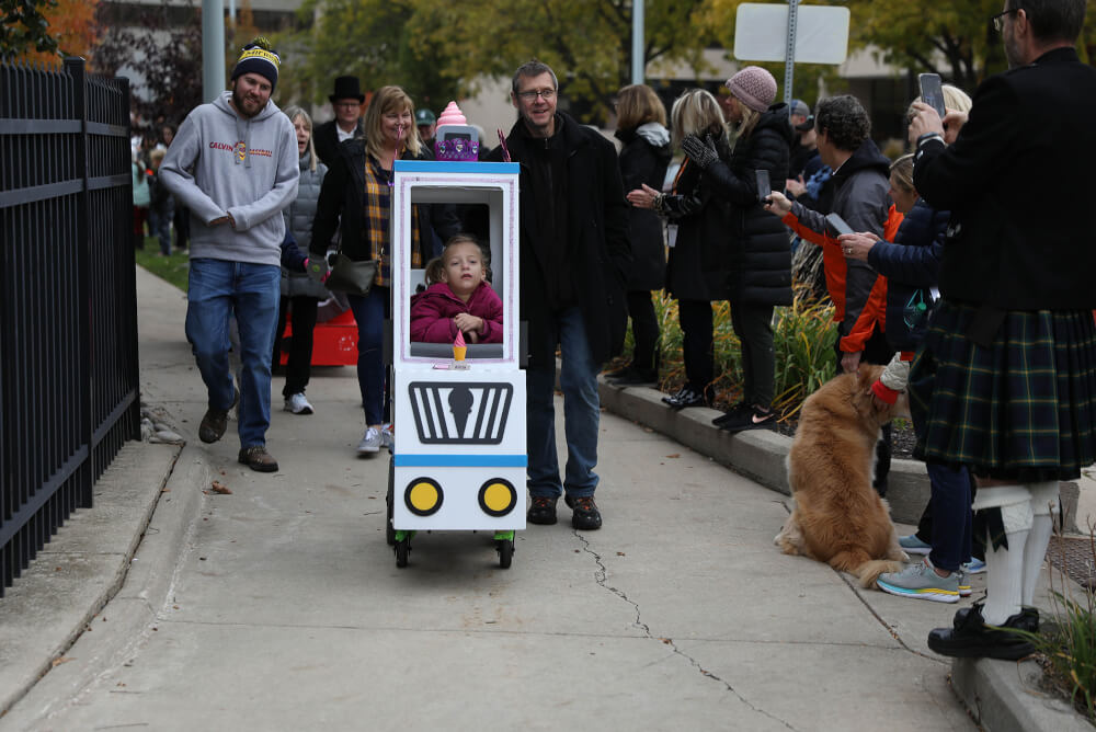 Alicia Marewski, 7, is a triplet with identical sisters. Her wheelchair was decorated as an ice cream truck, and her sisters were part of the costume as ice-cream shoppers.