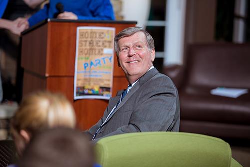 President Thomas J. Haas laughs during the student roast.