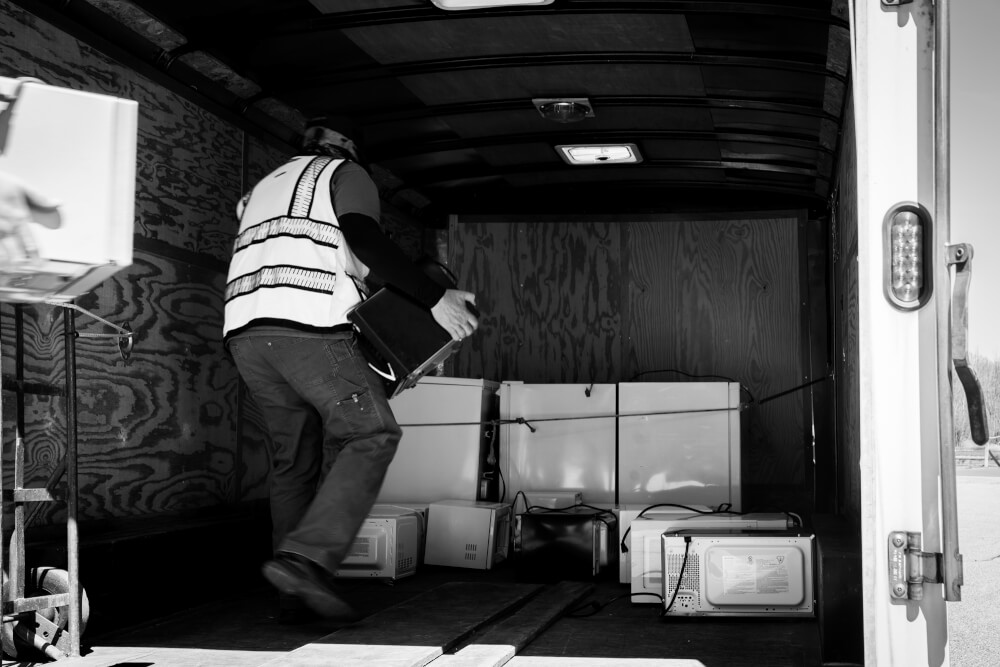 Appliances donated by GVSU students to Ottawa County are loaded into a truck Wednesday, May 13.