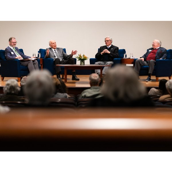 Panelists discuss Ralph Hauenstein during his 110th birthday celebration.