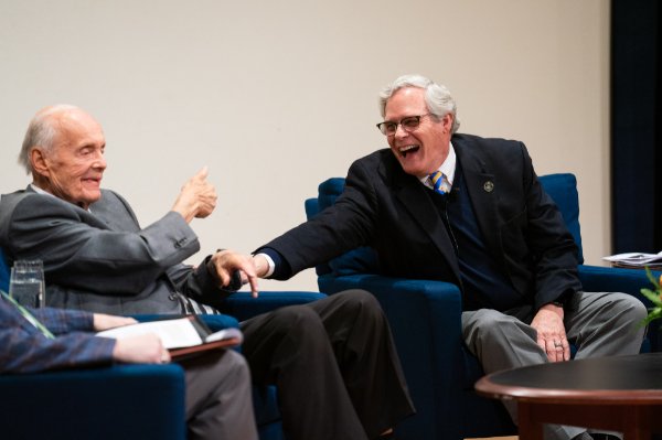 John Van Laar, left, and Gleaves Whitney share a laugh during Ralph Hauenstein's 110th birthday celebration on March 16. 