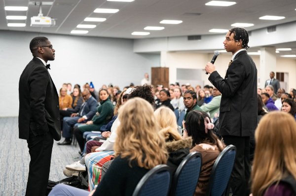 Antonio Green, right, asks Jerry Wallace a question after Wallace's presentation January 18 in the Kirkhof Center.