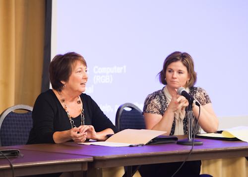 Patti Rowe, professor of movement science, discusses Title IX advances during a panel presentation while Keri Becker, right, looks on. 
