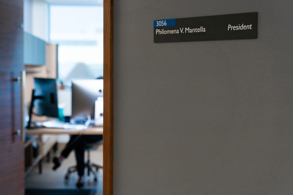 outside President Mantella's office, showing her nameplate