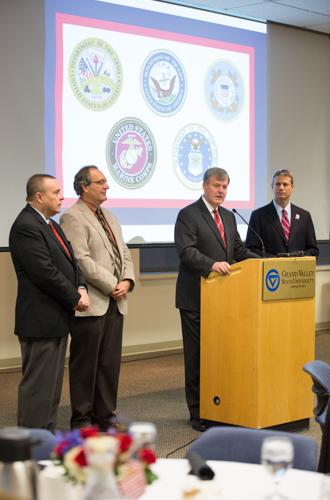 From left, Rep. Robert VerHeulen, Rep. Roger Victory, President Thomas J. Haas and Congressman Bill Huizenga at the Veterans Day breakfast.