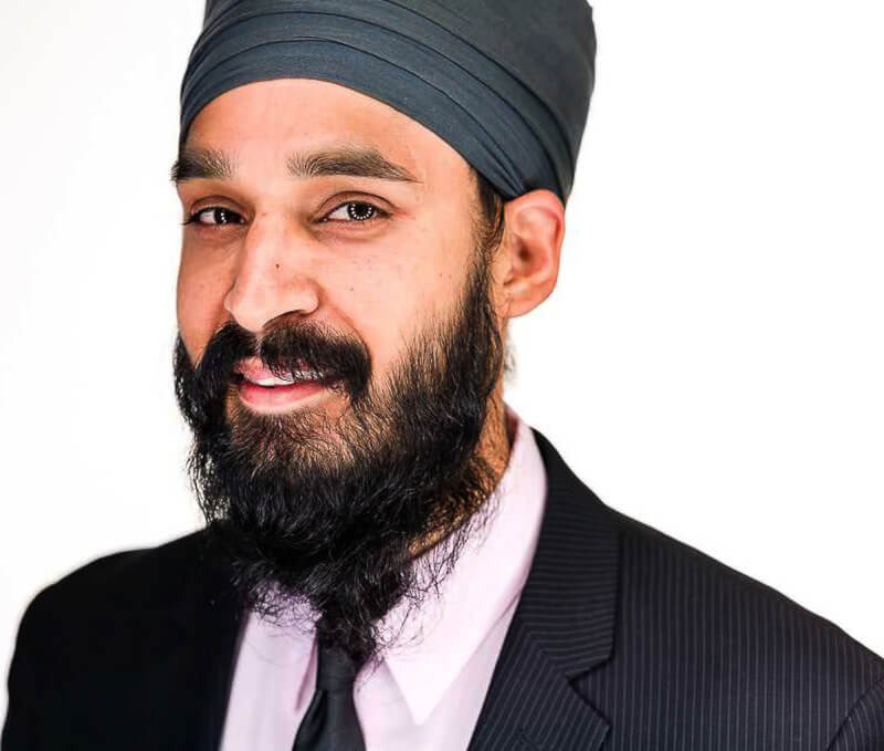 Photo of Simran Jeet Singh, assistant professor of religion at Trinity University and senior religion fellow with the Sikh Coalition