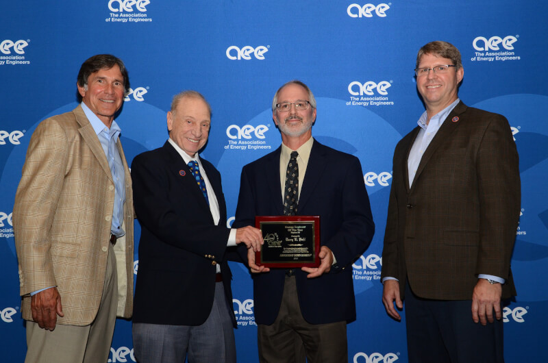 Terry Pahl, second front right, receives the Region III Energy Engineer of the Year award.