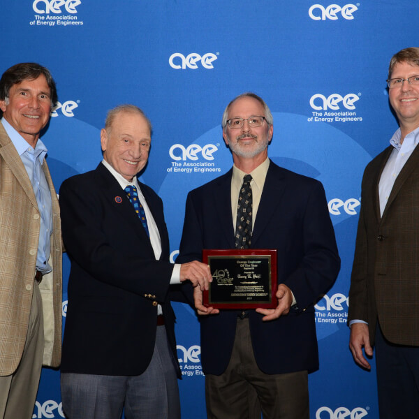 Terry Pahl, second front right, receives the Region III Energy Engineer of the Year award.