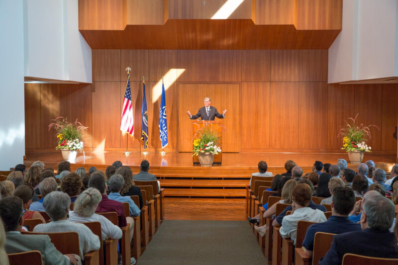 President Thomas J. Haas speaks to faculty and staff members.