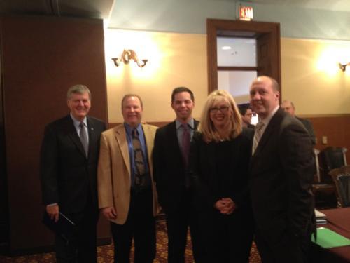 From left are President Thomas J. Haas, Peter MacGregor (R-Rockford), Student Senate President Andrew Plague, Sen. Tonya Schuitmaker (R-Lawton) and Curtis Hertel Jr. (D-Lansing).