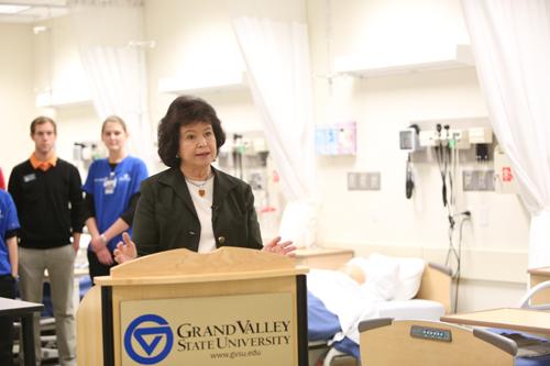 Gayle R. Davis, provost, speaks at a news conference October 31 in the Cook-DeVos Center for Health Sciences. She announced an expansion to the health campus, which was later approved by the board.