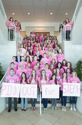 CHS students, faculty and staff members wear pink in memory of Stephanie Urbanawiz, a physician assistant studies major who died in February, and to raise money for a scholarship fund in her name.