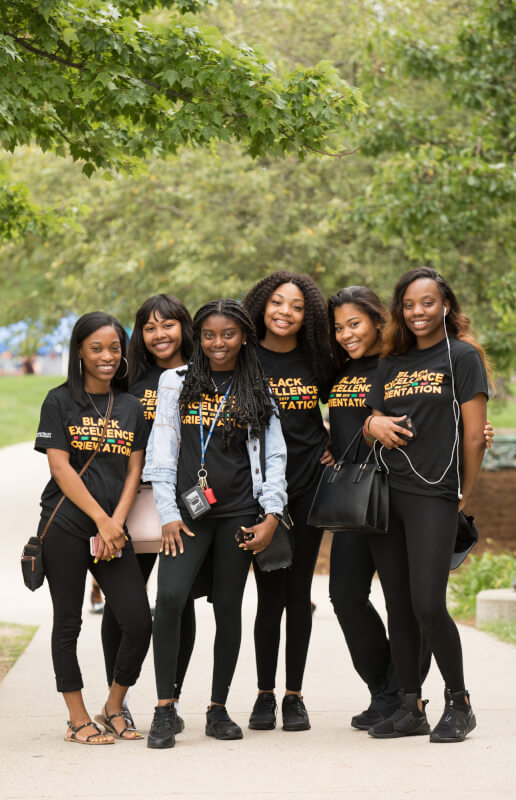  Six female students smiling during black excellence orientation