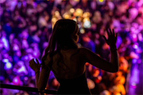 A student dances on the upper balcony during Presidents' Ball.