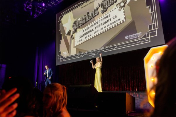 Evan Jackson, president of Student Senate, and Malia Rodolico, president of traditions for the Campus Activities Board, emcee Presidents' Ball.