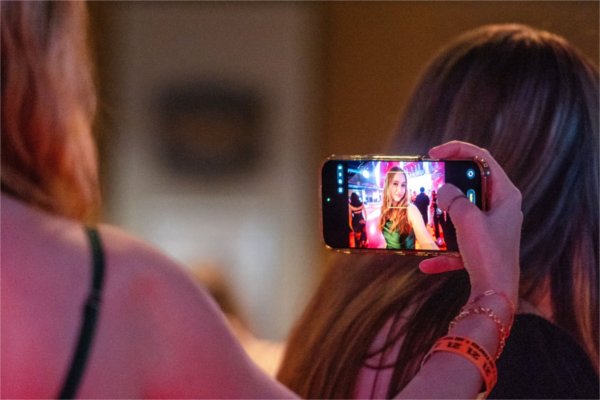 Elise Moore, a senior education major, poses for a selfie while attending the President's Ball at GLC Live ant 20 Monroe February 28. (Photo release on file)