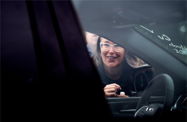 Vice President for Student Affairs Jenny Hall-Jones greets a student and his family during move-in day on Grand Valley's Valley Campus in Allendale. 