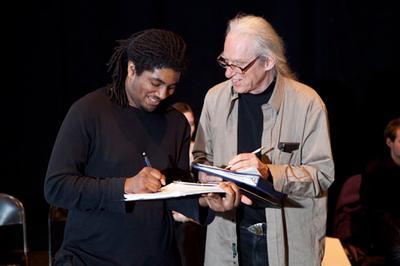 A student works with Max Bush, '72, on development of a play at Grand Valley