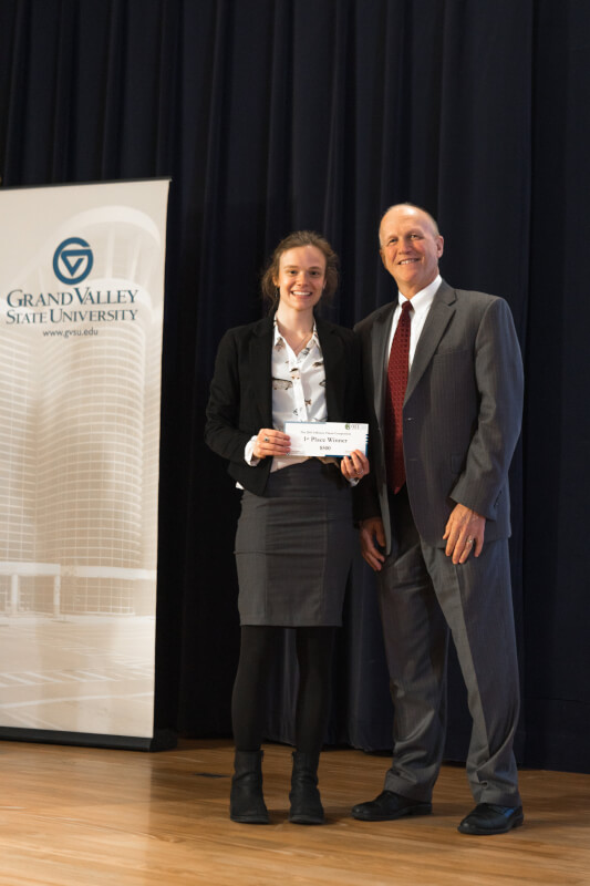 Sarah Lamar, pictured with Jeff Potteiger, dean of The Graduate School, won first place for her research, "Biological Invasions on a Large Scale: Investigating the Spread of Baby's Breath (Gypsophila paniculata) Across North America."