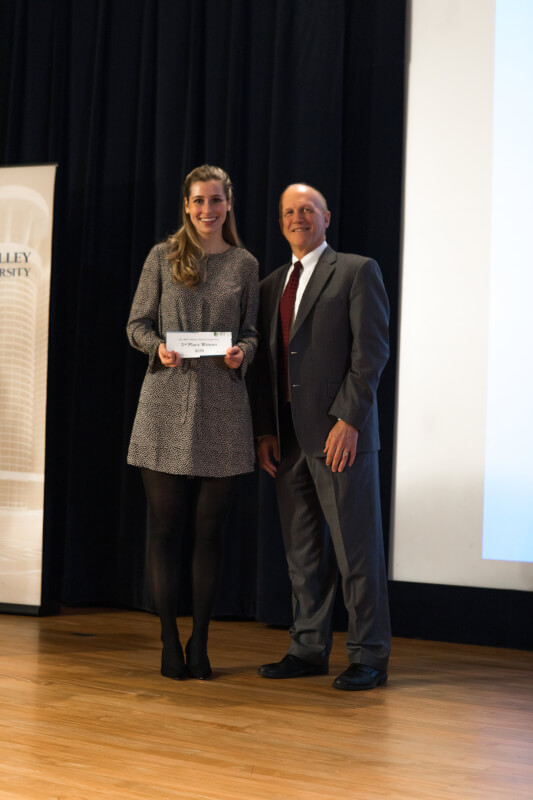 Jenna Buchman, pictured with Jeff Potteiger, dean of The Graduate School, won second place for her research, "The Evaluation of a Nerve Block Protocol in Patients with Hip Fractures." 