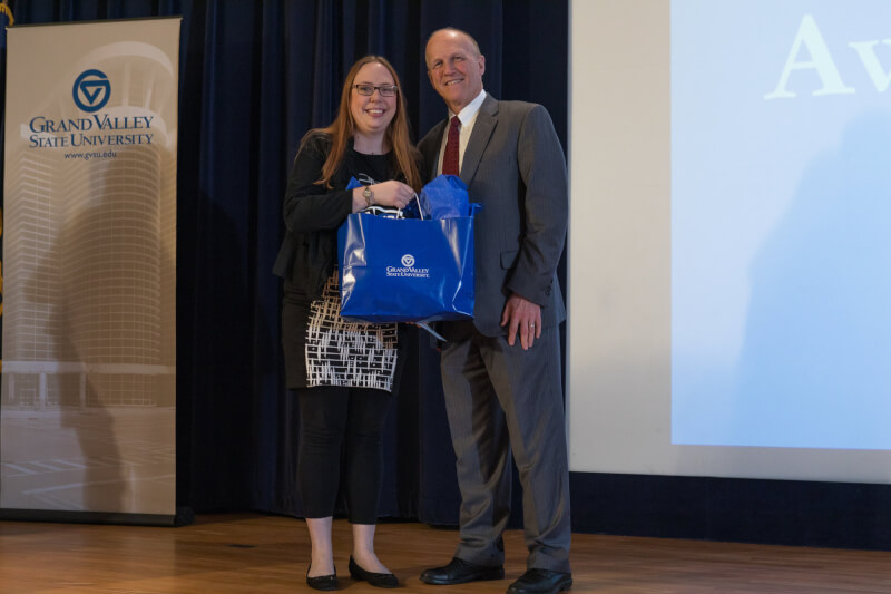 Noelle Lynn, pictured with Jeff Potteiger, dean of The Graduate School, won the People's Choice award for her research, "Women & ADHD Functional Impairments: Beyond the Obvious."
