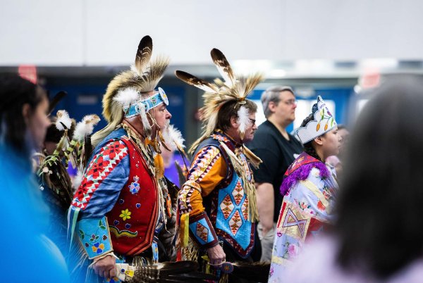 Dressed in regalia, dancers circle the drummers during the 22nd "Celebrating All Walks of Life" Pow wow.
