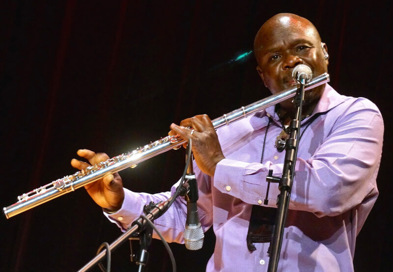 Samite will give a presentation on October 11 in the DeVos Center.