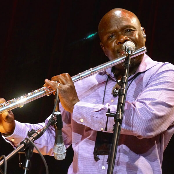 Samite will give a presentation on October 11 in the DeVos Center.