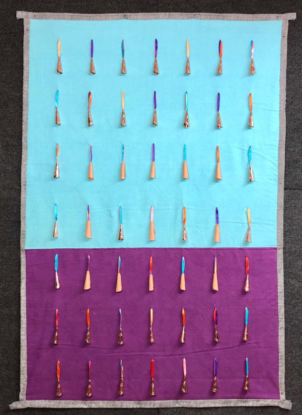 Mobbish Waboyan (Water Blanket), Hand-dyed and hand-sewn muslin, wool, local clay, copper tobacco lids, polyester ribbon, artificial sinew