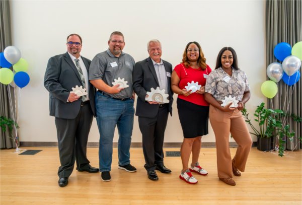 The Innovator of the Year Award Finalists pose with their tophies