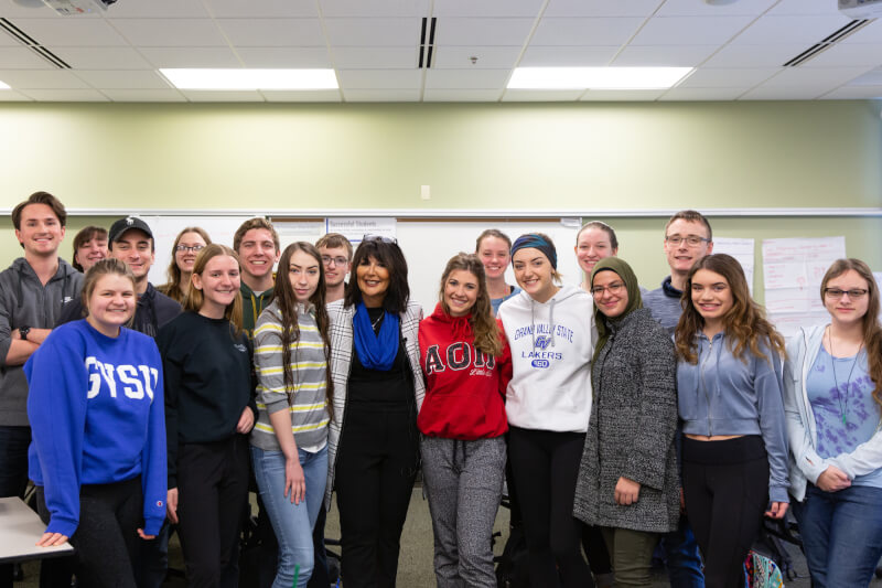 President-elect Mantella visiting with students in a classroom.