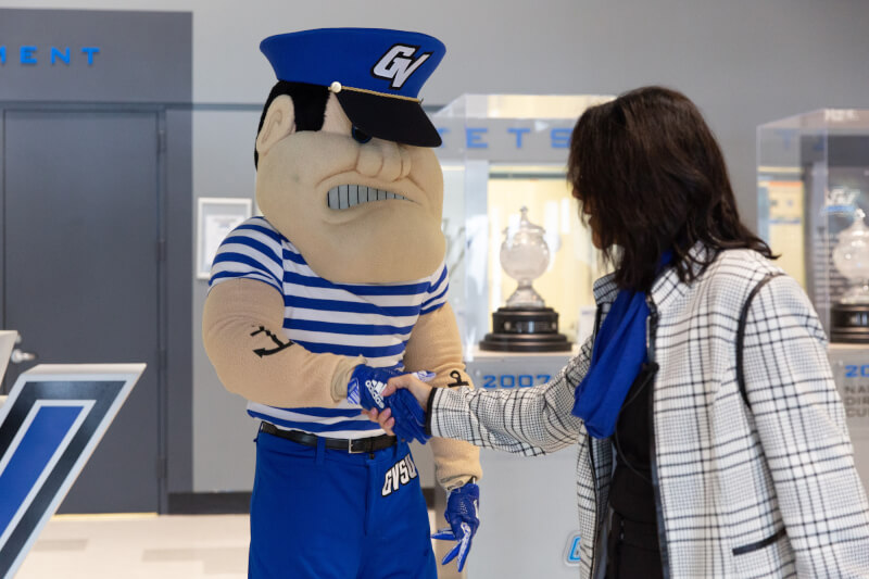 President-elect Mantella meeting Louie the Laker for the first time.