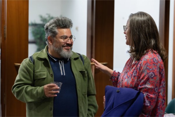 Tiburcio Lince, left, and Jenny Hall-Jones visit prior to the event.