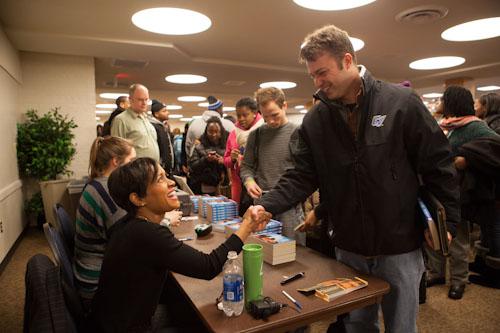 Judge Glenda A. Hatchett greets a participant at the 2013 Martin Luther King Jr. commemoration. This year's events feature two keynote speakers and many activities.