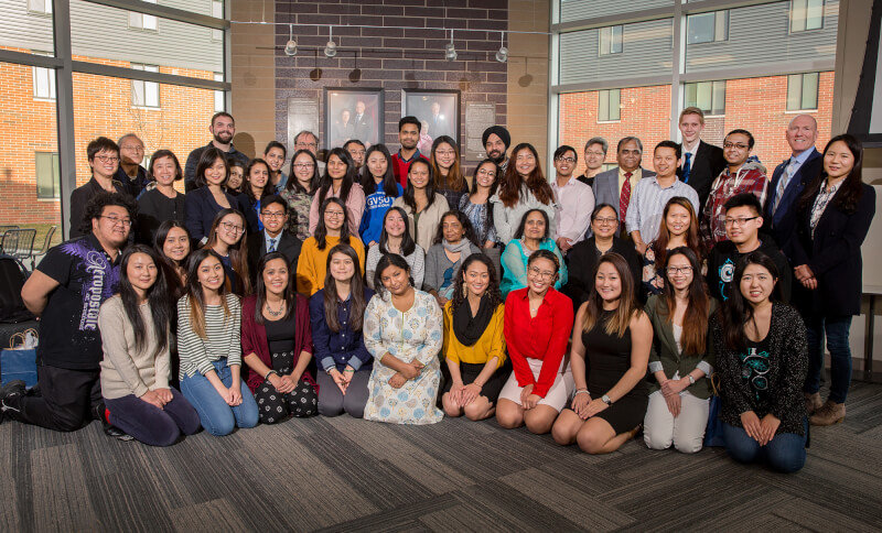 large group of people, kneeling and standing