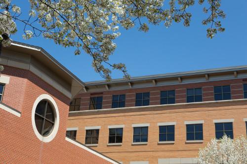 Faculty and staff members with presentations or publications are listed.