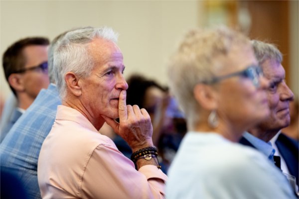Jerry Callahan, with Van Andel Institute, listens to Leroy Hood speak during &#8220;Is Your Body a Data Center: The Future of Human Health&#8221; as part of Tech Week. 