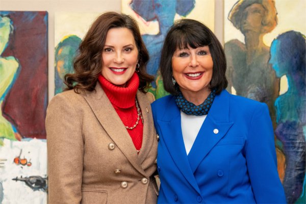 Governor Gretchen Whitmer and Grand Valley President Philomena V. Mantella smile for a photo.