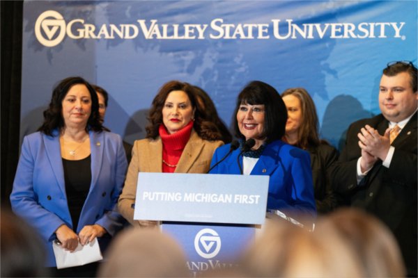 Grand Valley president Philomena V. Mantella speaks to the audience at Governor Gretchen Whitmer's signing of a supplemental funding bill. 