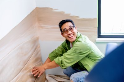 Math Professor Paul Yu shows off the 3D elements of his murals