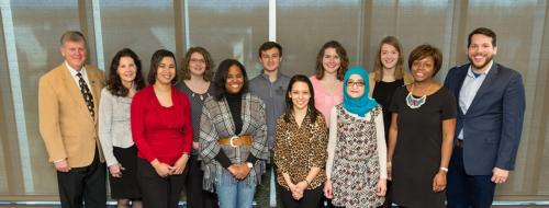 Pictured from left to right are President Thomas J. Haas, Meridell Gracias, Keesha Hardiman, Suzanne Rogers, Lauren McElrath, Daniel Cowden, Mirna Herrera, Jennifer Abbott, Ghada Mohsen, Taylor Vadenboncoeur, Chasity Bailey-Fakhoury and Jesse Bernal. 