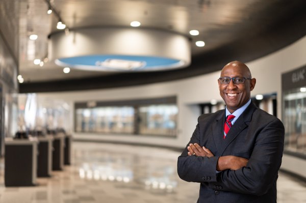 Walter Moore, associate director of athletics for student athlete welfare and development, smiles for a photo