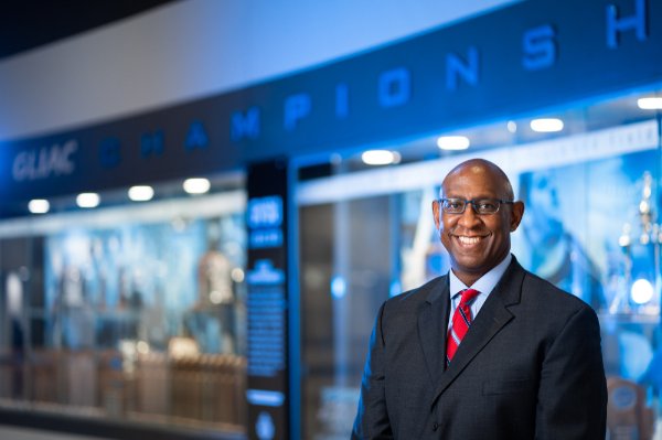 Walter Moore, associate director of athletics for student athlete welfare and development, smiles for a photo