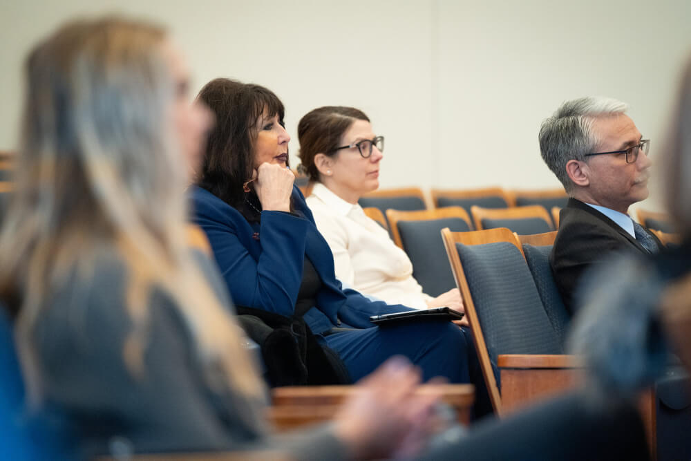 President Philomena Mantella, Provost Maria Cimitile and Dean of Students Loren Rullman listen at the first State of the Student Body.