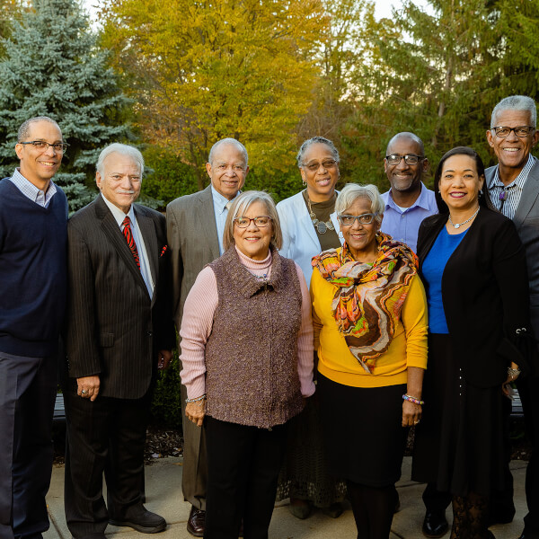 Two rows of people standing