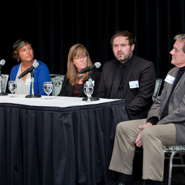 A photo of panelists.
